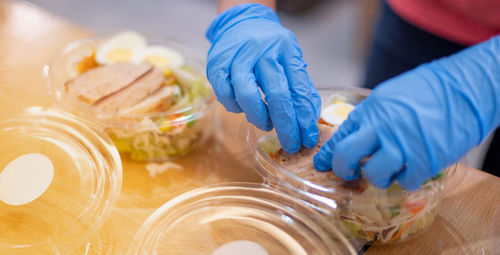 Midsection of man preparing food