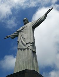 Low angle view of statue against sky