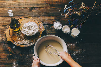 Directly above shot of person preparing food on table