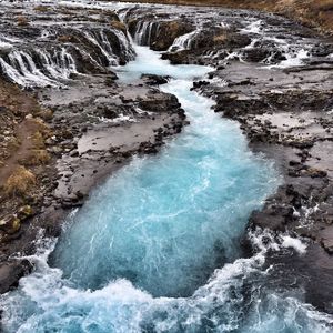 Stream flowing through rocks