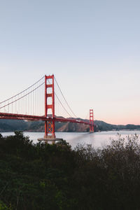 Suspension bridge over river