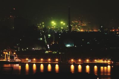 Illuminated cityscape at night