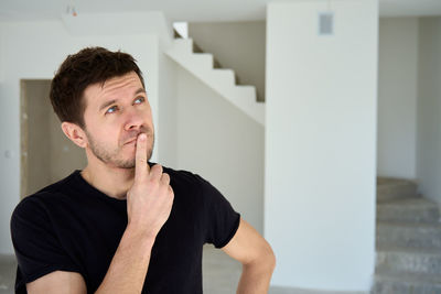 Young man drinking water