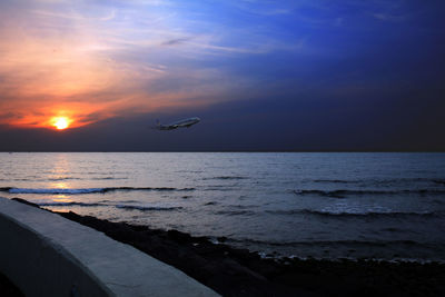 Scenic view of sea against sky during sunset