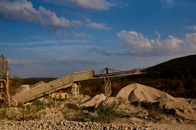 Bridge over land against sky