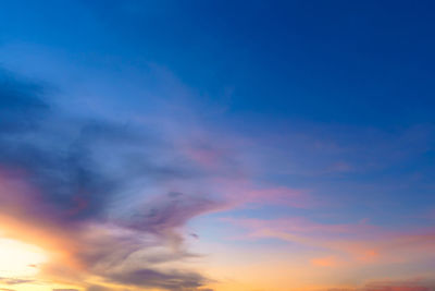 Low angle view of dramatic sky during sunset