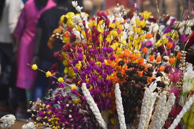 Close-up of purple flowering plants at market stall