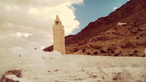 Low angle view of lighthouse against clear sky