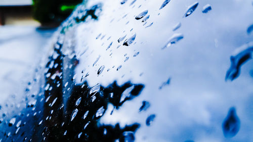 Close-up of water drops on glass