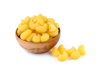 Close-up of yellow fruits on white background