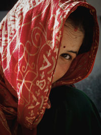 Close-up portrait of beautiful woman wearing headscarf