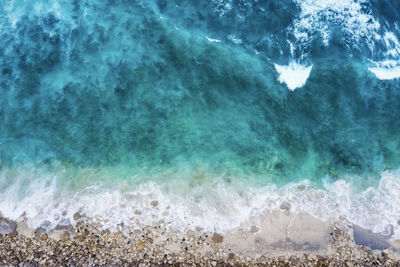 Waves splashing on shore