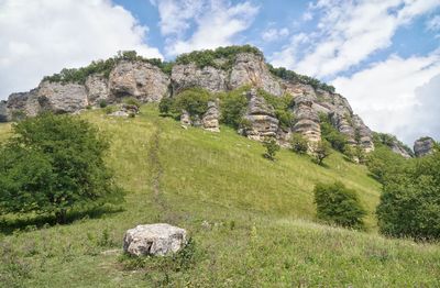 Scenic view of rocks against sky