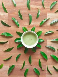 High angle view of green tea or matcha tea on table