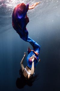 Woman swimming in sea