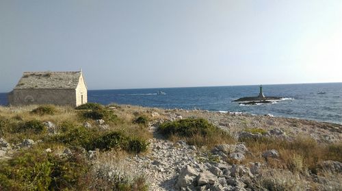 Scenic view of sea against clear sky