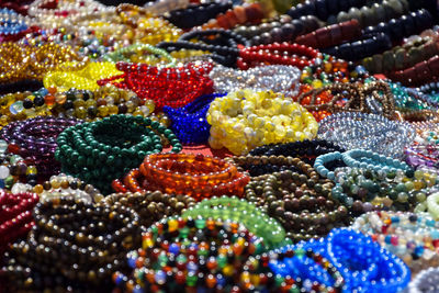 Women's jewelry, small business. handmade bracelets made on the counter of a street market