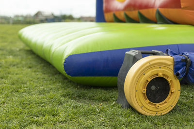 Close-up of vintage car on field