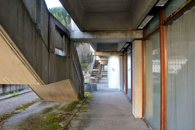 Empty alley amidst buildings in city