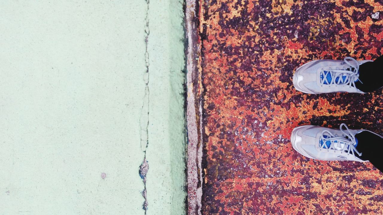 text, communication, wall - building feature, western script, safety, close-up, sign, day, part of, guidance, outdoors, protection, white color, wall, built structure, textured, paint, number, metal, no people