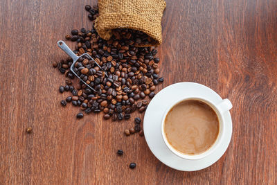 High angle view of coffee cup on table