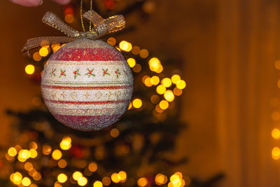 Close-up of illuminated christmas tree at night