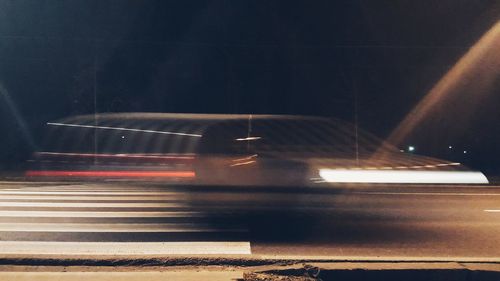 Illuminated car at night