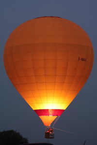 Low angle view of hot air balloon against clear sky