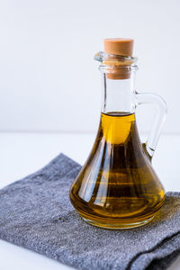 Fresh and delicious olive oil on kitchen towel. ingredients for food cooking. healthy eating. keto 