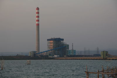 View of factory against sky