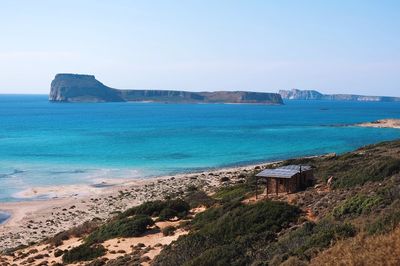 Scenic view of sea against blue sky