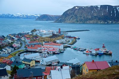 High angle view of harbor by sea against sky