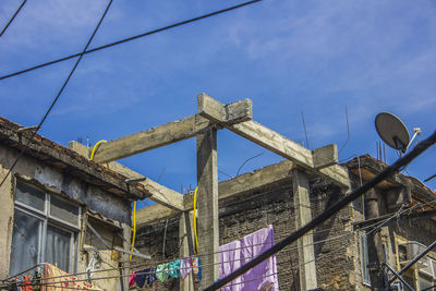 Low angle view of old building against sky