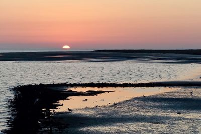 Scenic view of sea during sunset