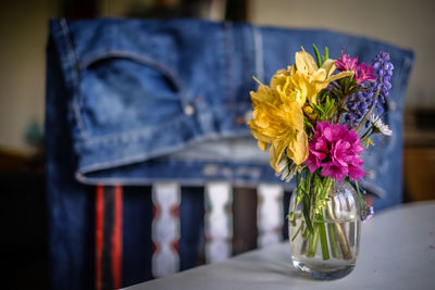 Close-up of flowers in vase on table