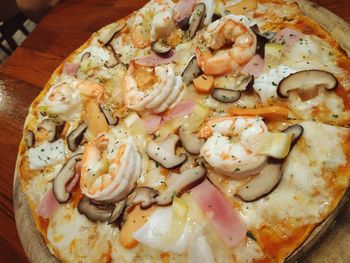 High angle view of pizza served in plate