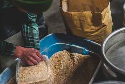 Close-up of man preparing food