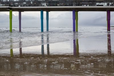 Pier on sea against sky