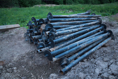 High angle view of pipes on field