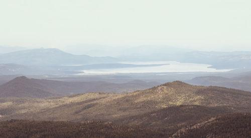 Scenic view of landscape and mountains against sky