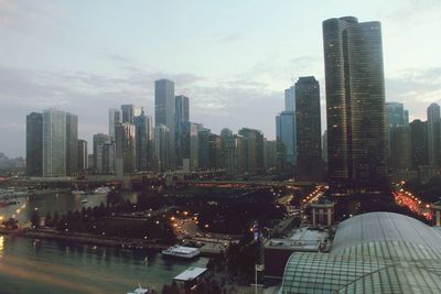 City lit up at dusk