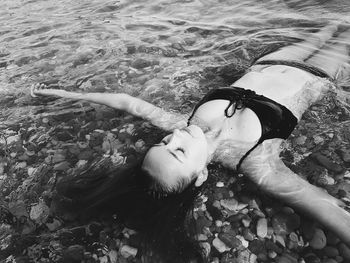 High angle view of woman swimming in pool