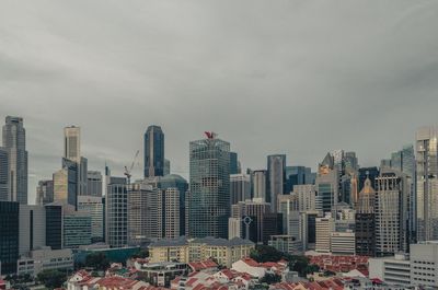 Modern buildings in city against sky