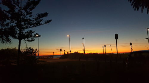 Scenic view of landscape against sky at sunset