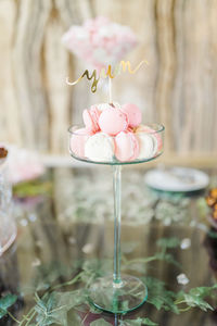 Close-up of pink macaron on table