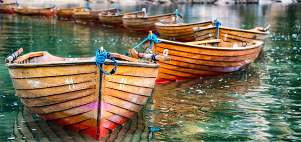 Fishing boats moored in lake