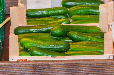 Close-up of zucchinis on wood