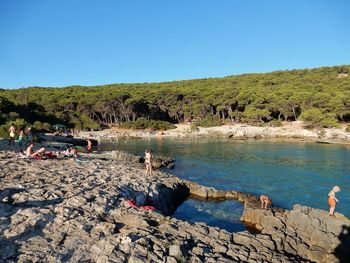 Scenic view of sea against clear blue sky