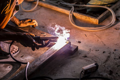 Man working on metal