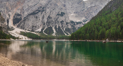 Scenic view of lake by mountains